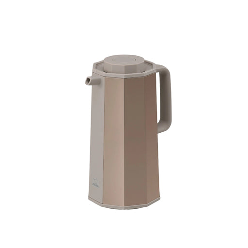 Beige thermos jug on a white background