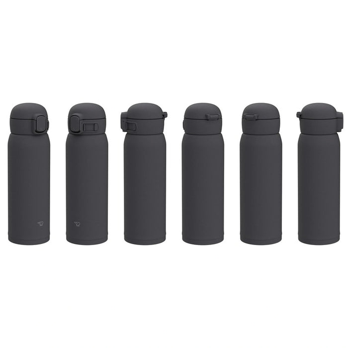 Six black insulated bottles with silver caps on a white background