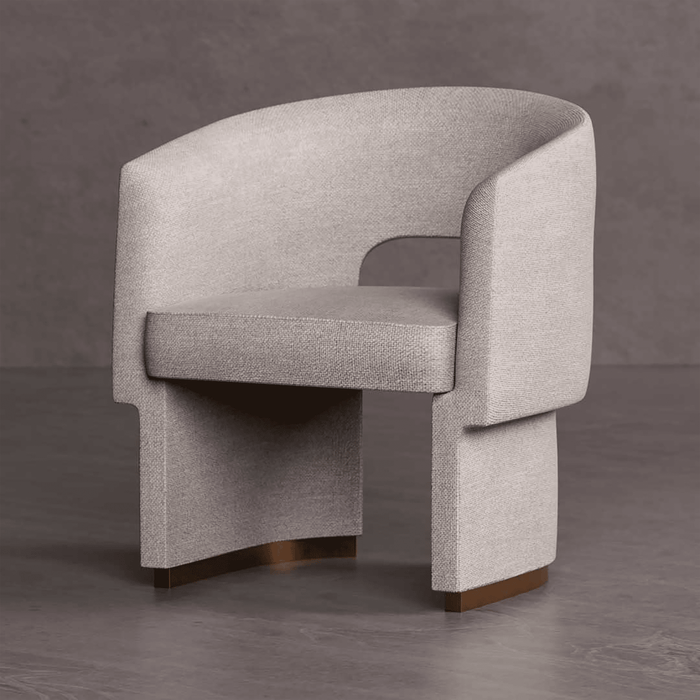 Gray upholstered chair with a textured finish on a gray background