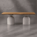 Dining table with wooden top and concrete cylindrical legs on a gray background