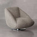 Modern gray textured armchair on a gray background