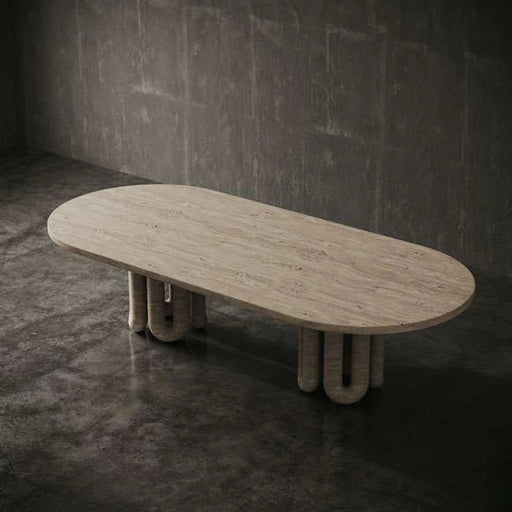 Wooden table with unique base design on a dark concrete floor and wall.