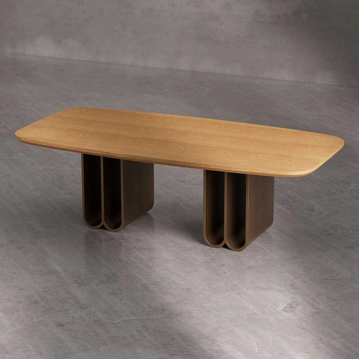 Wooden table with unique base design on a gray concrete floor
