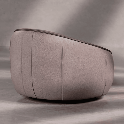 Gray fabric ottoman on a gray background