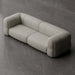 Beige sofa on a gray concrete floor