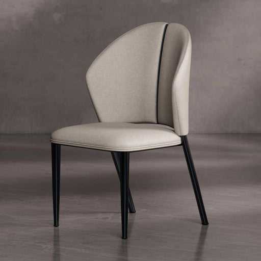 Beige chair with black legs on a gray background