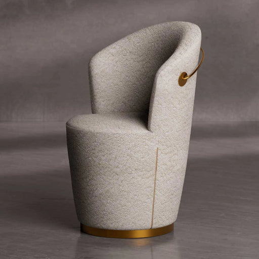 Modern chair with curved design and gold accents on a gray background