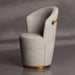 Modern chair with curved design and gold accents on a gray background