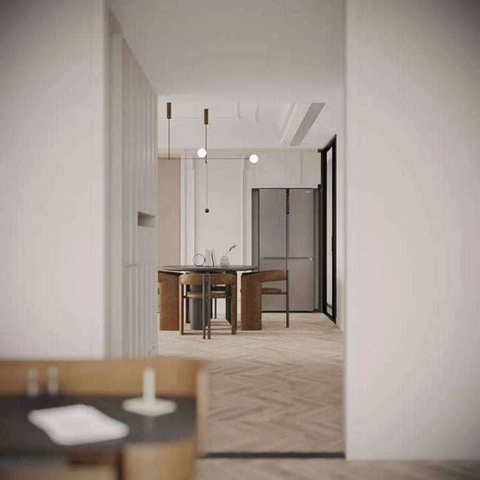 Modern interior with a dining area and kitchen.