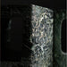 Close-up of a textured stone surface with a dark background