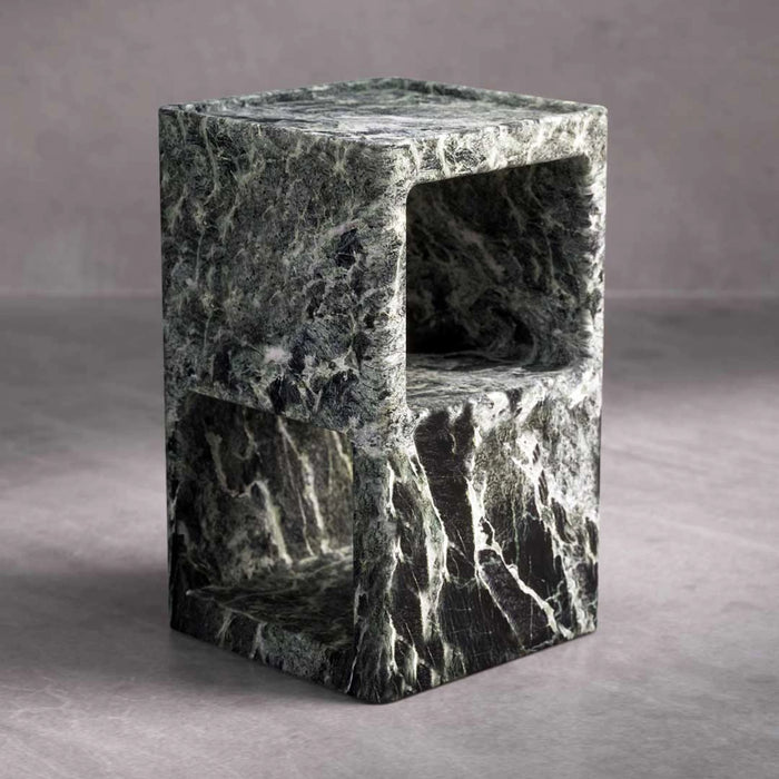 Marble cube stool on a gray background