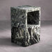 Marble cube stool on a gray background