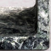 Close-up of a marble surface with gray and white patterns