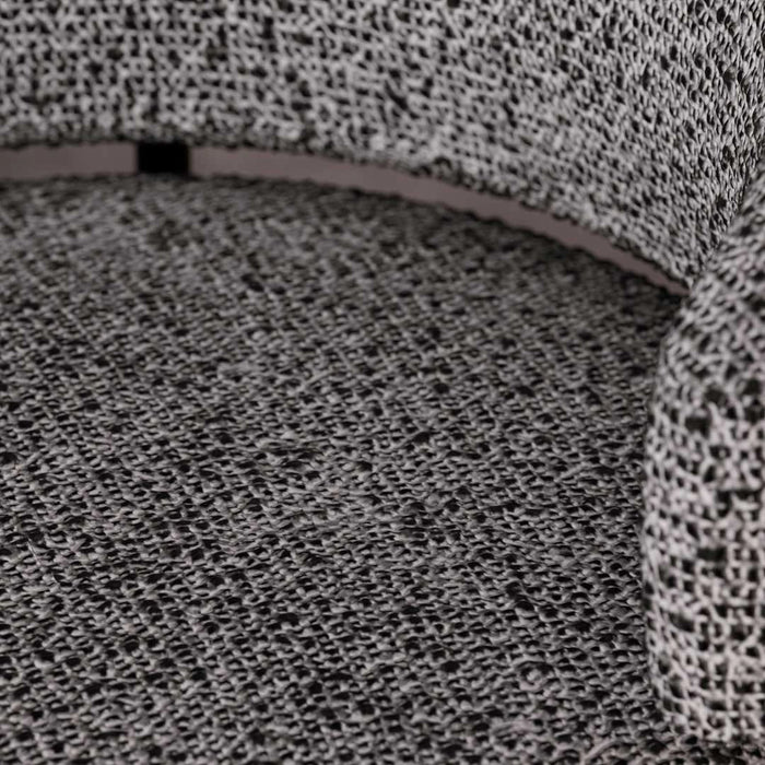 Close-up of textured gray carpet with patterned border