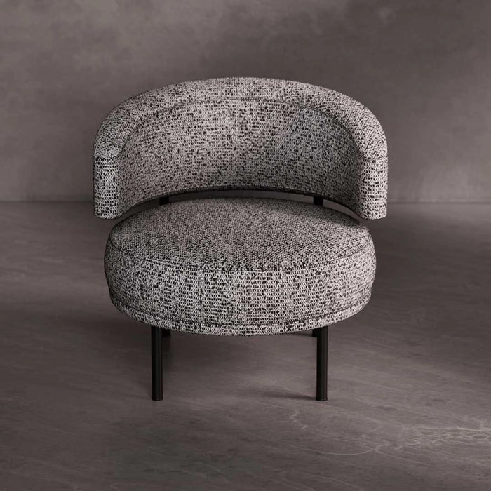 Modern chair with textured gray upholstery on a dark background