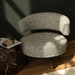 Modern chair with textured pattern in a room setting