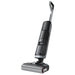 Black and silver vacuum cleaner on a white background