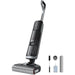Vacuum cleaner with attachments on a white background