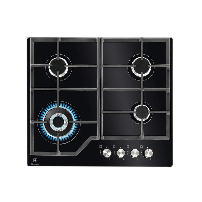 Black gas cooktop with four burners on a white background