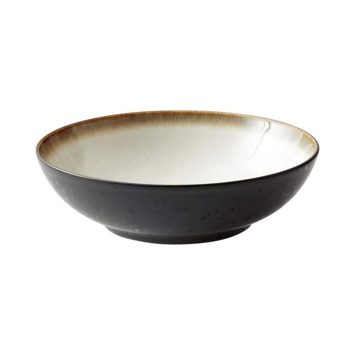 Ceramic bowl with a two-tone design on a transparent background