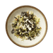 Plated dish of seaweed salad on a white plate with a green background