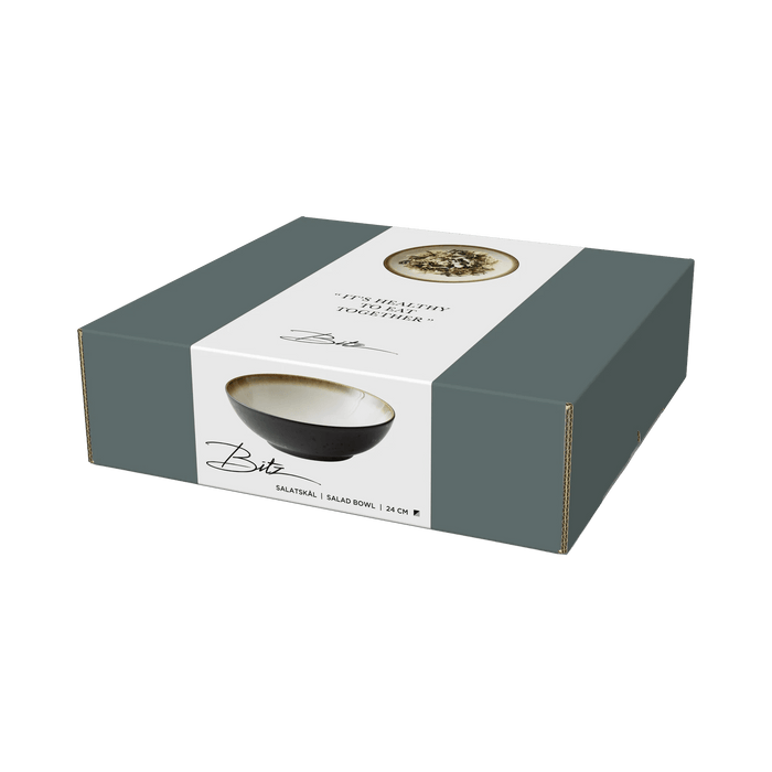 Box packaging of a ceramic bowl with branding on a green background