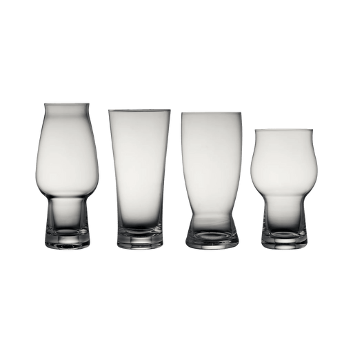 Four clear glass tumblers on a white background