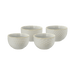 Set of four white textured bowls on a green background