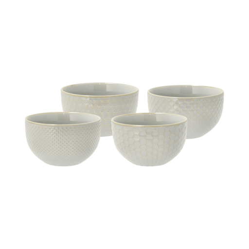 Set of four ceramic bowls with textured surface on a green background