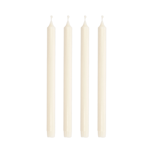 Four white candles on a green background