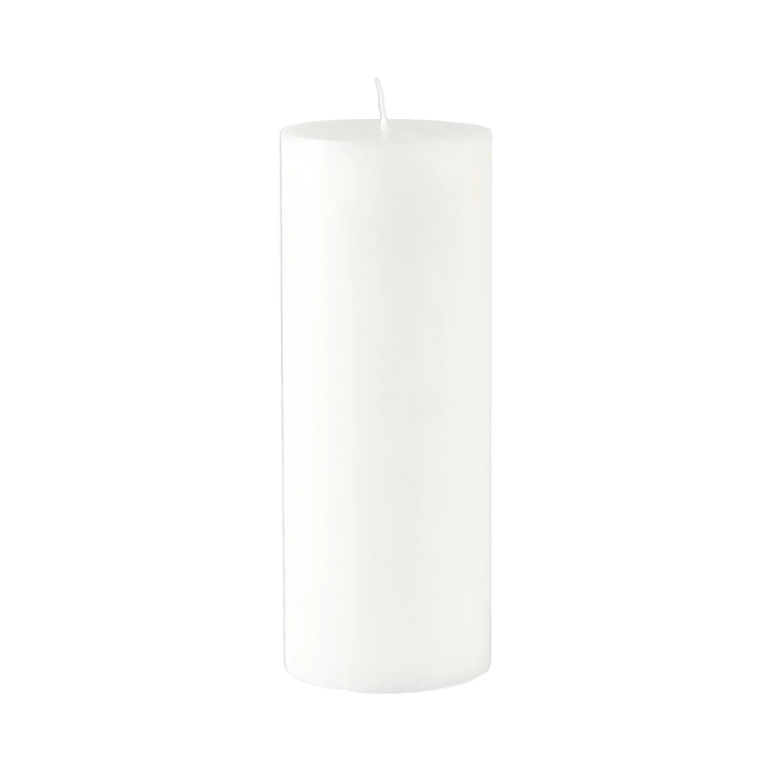 White pillar candle on a white background