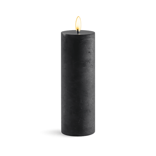 Black candle with a flame on a white background