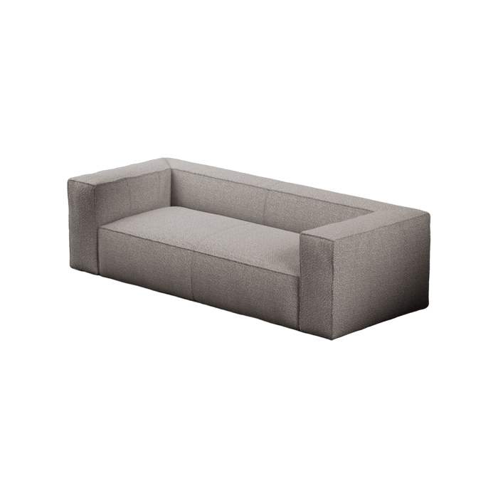 Gray sofa on a green background