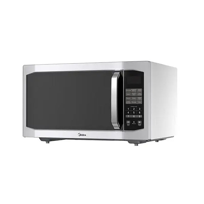 Stainless steel microwave oven on a white background