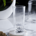 Clear glass on a marble surface with a blurred background