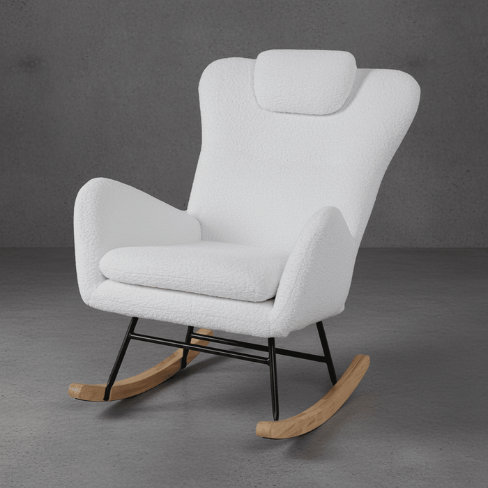 White rocking chair with wooden legs on a gray background