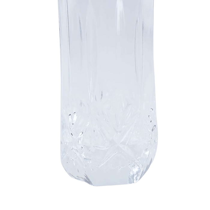 Clear crystal-like object on a green background