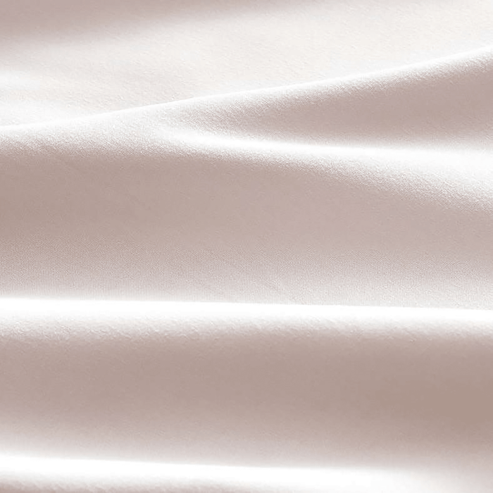 Close-up of beige fabric with subtle texture