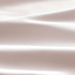 Close-up of beige fabric with subtle texture