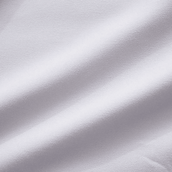Close-up of white fabric with subtle texture