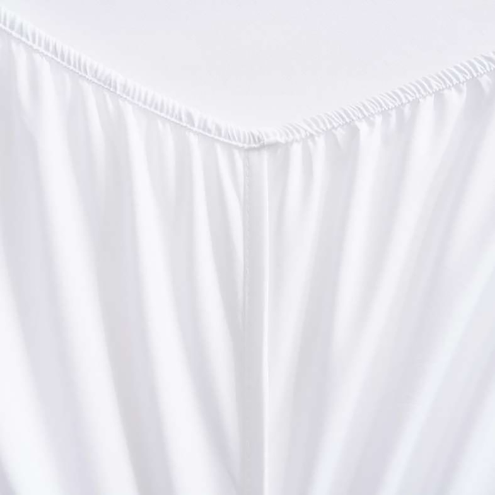 White satin sheet with a fitted top corner on a white background