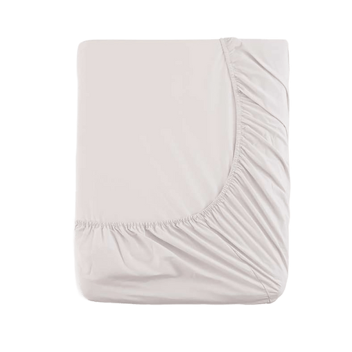 Light pink fitted sheet on a green background