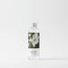 White jasmine diffuser bottle on a white background