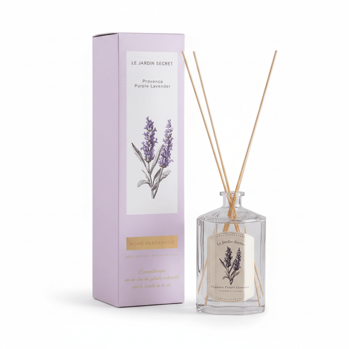 Lavender diffuser with packaging on a white background