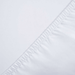 Close-up of a white fabric with a subtle pattern