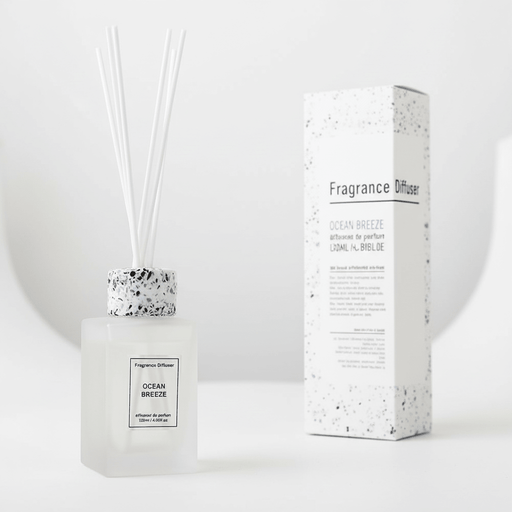 Fragrance diffuser with packaging on a white background