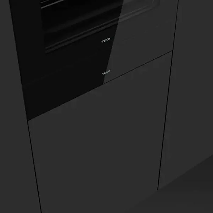 Close-up of a black kitchen appliance with Teka branding.