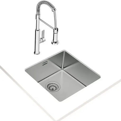 Stainless steel kitchen sink with a modern faucet on a white background