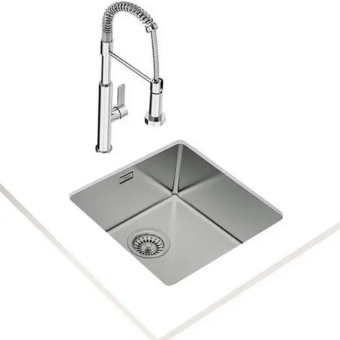 Stainless steel kitchen sink with a modern faucet on a white background