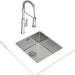 Stainless steel kitchen sink with a modern faucet on a white background